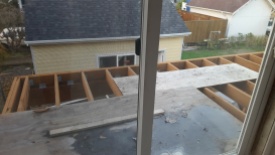 Looking out the sliding glass doors onto the deck off the master